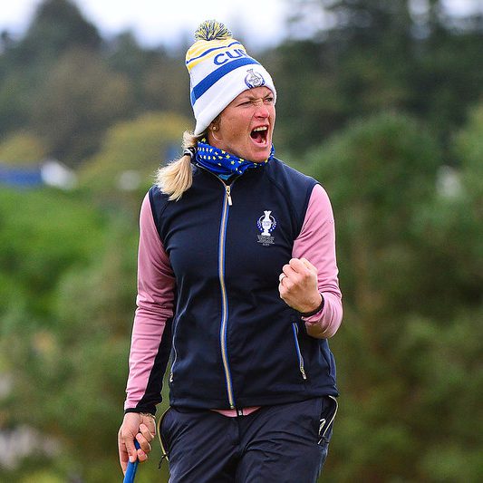 Suzann Pettersen of Norway celebrates a winning out on the 8th green during Saturday afternoon fourballs